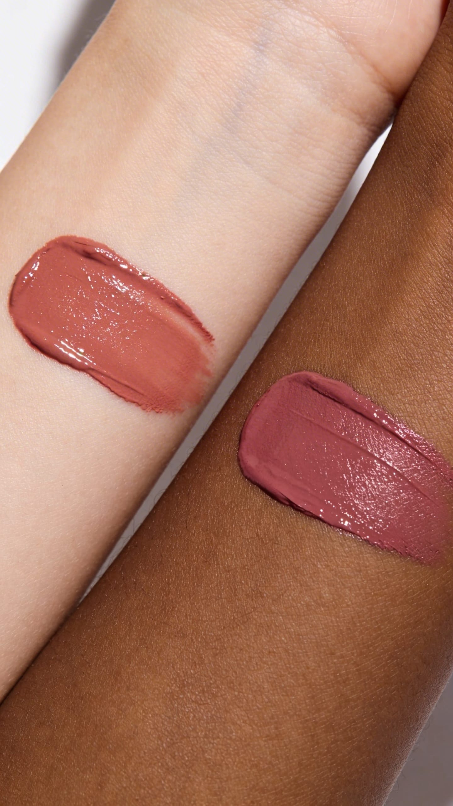 Fruit-pigmented lipstick swatches on fair and deep skin